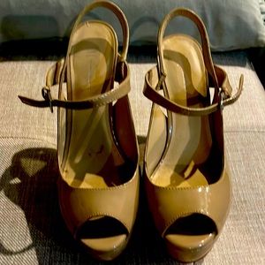 Beige Patten Leather shoes with heel.  Elegant sexy and never worn. Size 10 1/2